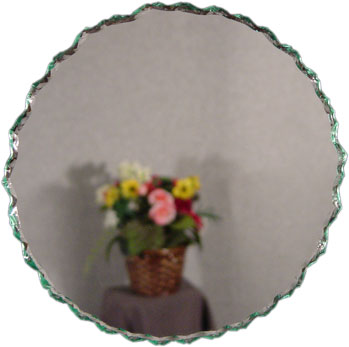 Round frameless chipped edge mirror