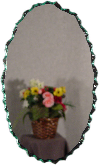 Chipped oval frameless mirror